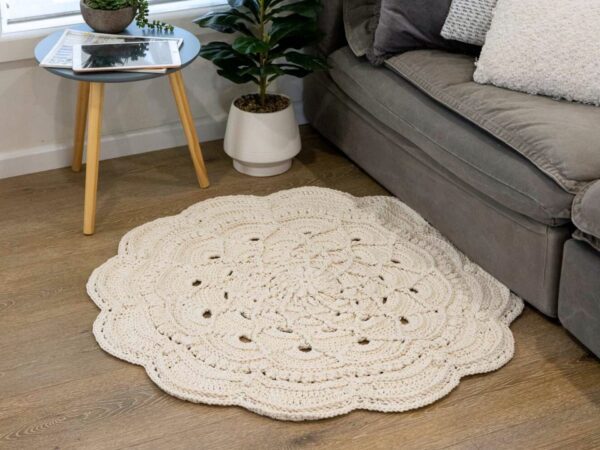Crochet floor rug next couch