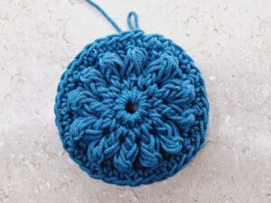 Round 4 of crochet sample square.