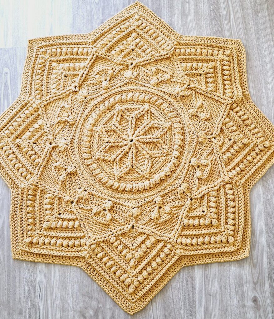 Star shaped crochet floor rug.