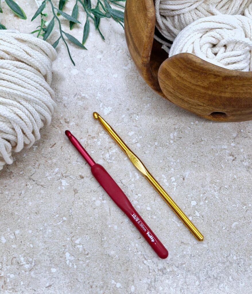 Red and yellow crochet hooks.
